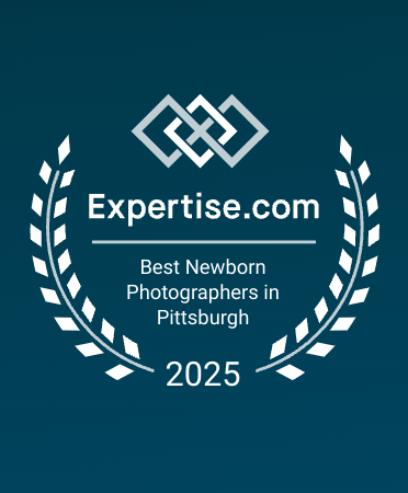 An Expertise.com award badge recognizing Best Newborn Photographers in Pittsburgh for 2025 with laurel wreath design.