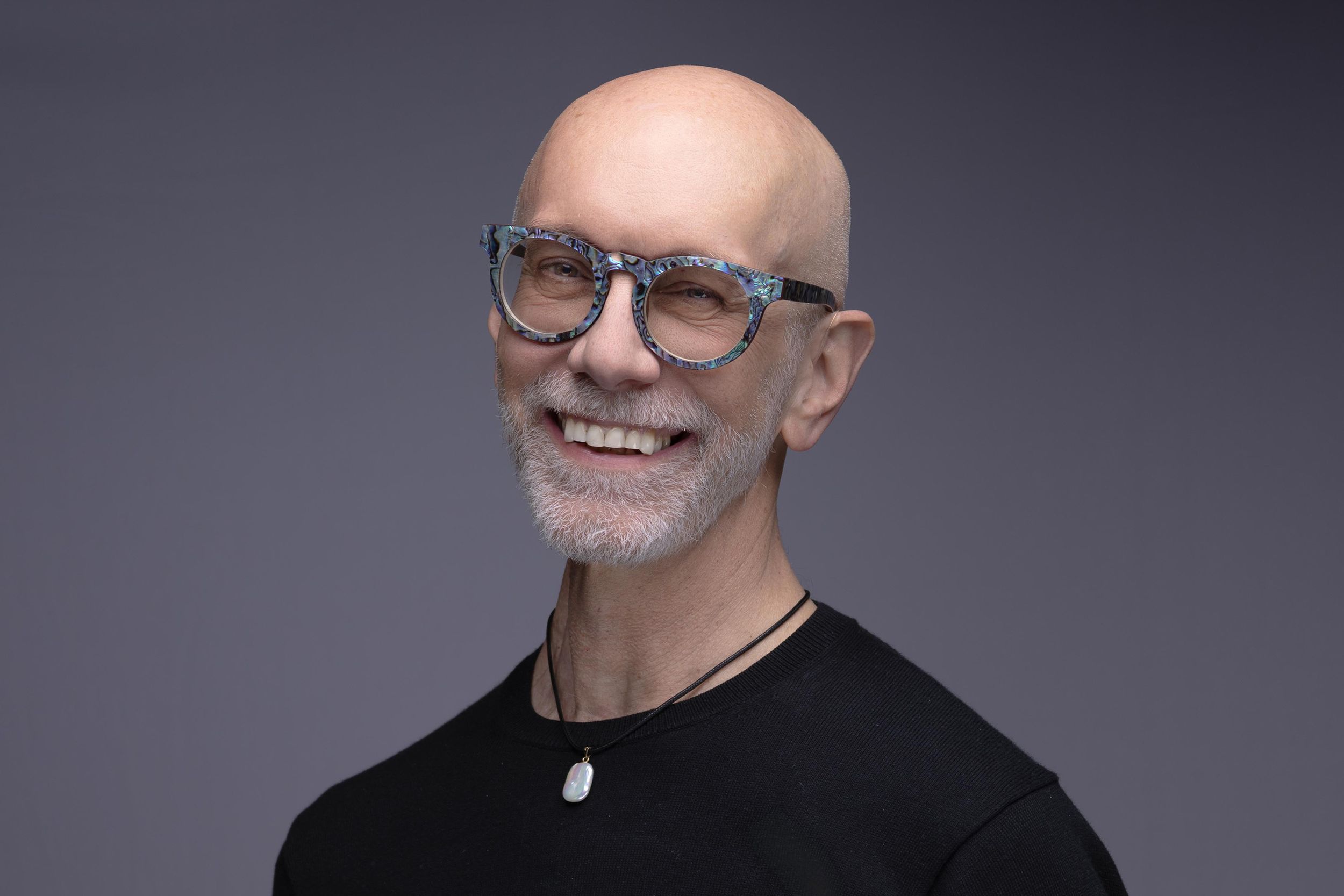 Professional headshot of a business professional with happy expression