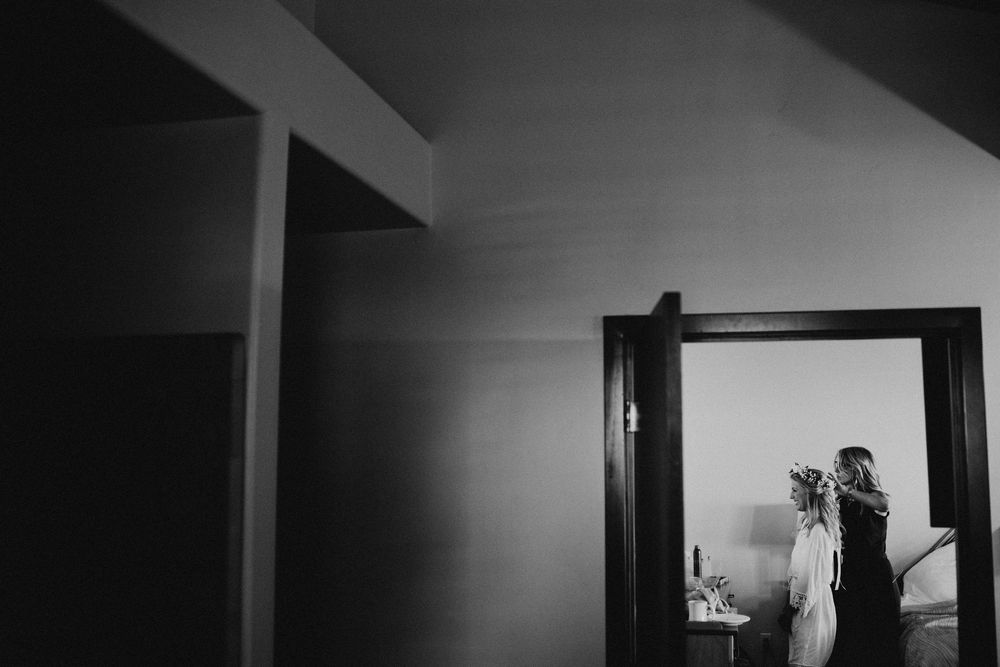 A dramatic black and white photo series showing interior doorways and hallways with strong shadows and light contrast.
