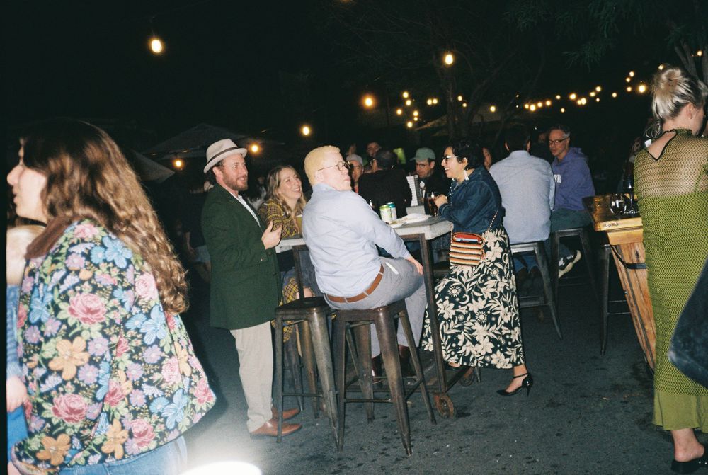 35mm film photographer Holly Castillo captures candid moments at Los Angeles wedding reception.