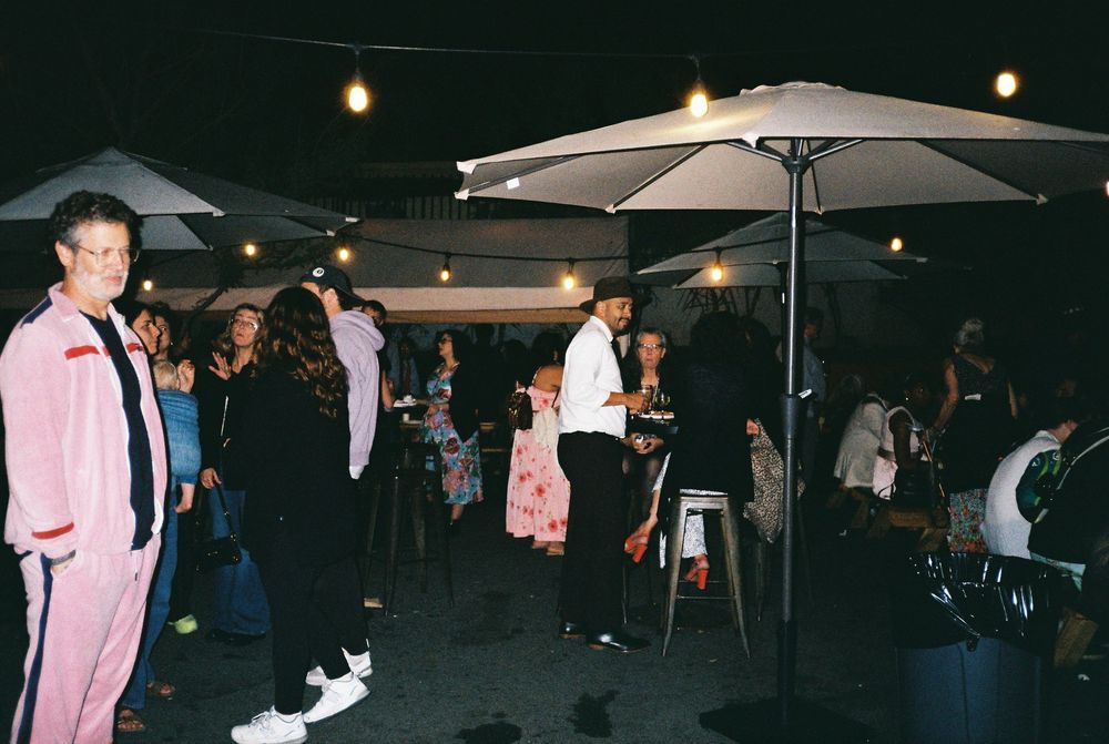 Film photography of guests casually mingling at Los Angeles Highland Park brewery the Hermosillo.