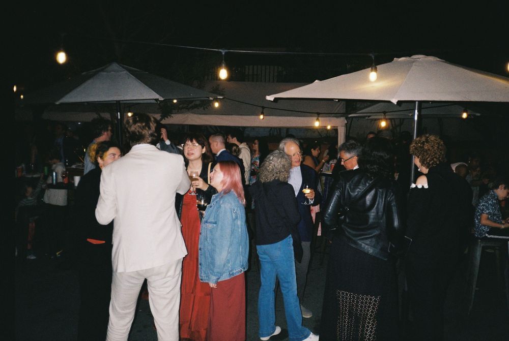 Guests dance and laugh at the Hermosillo Bar in Highland Park for a wedding reception.