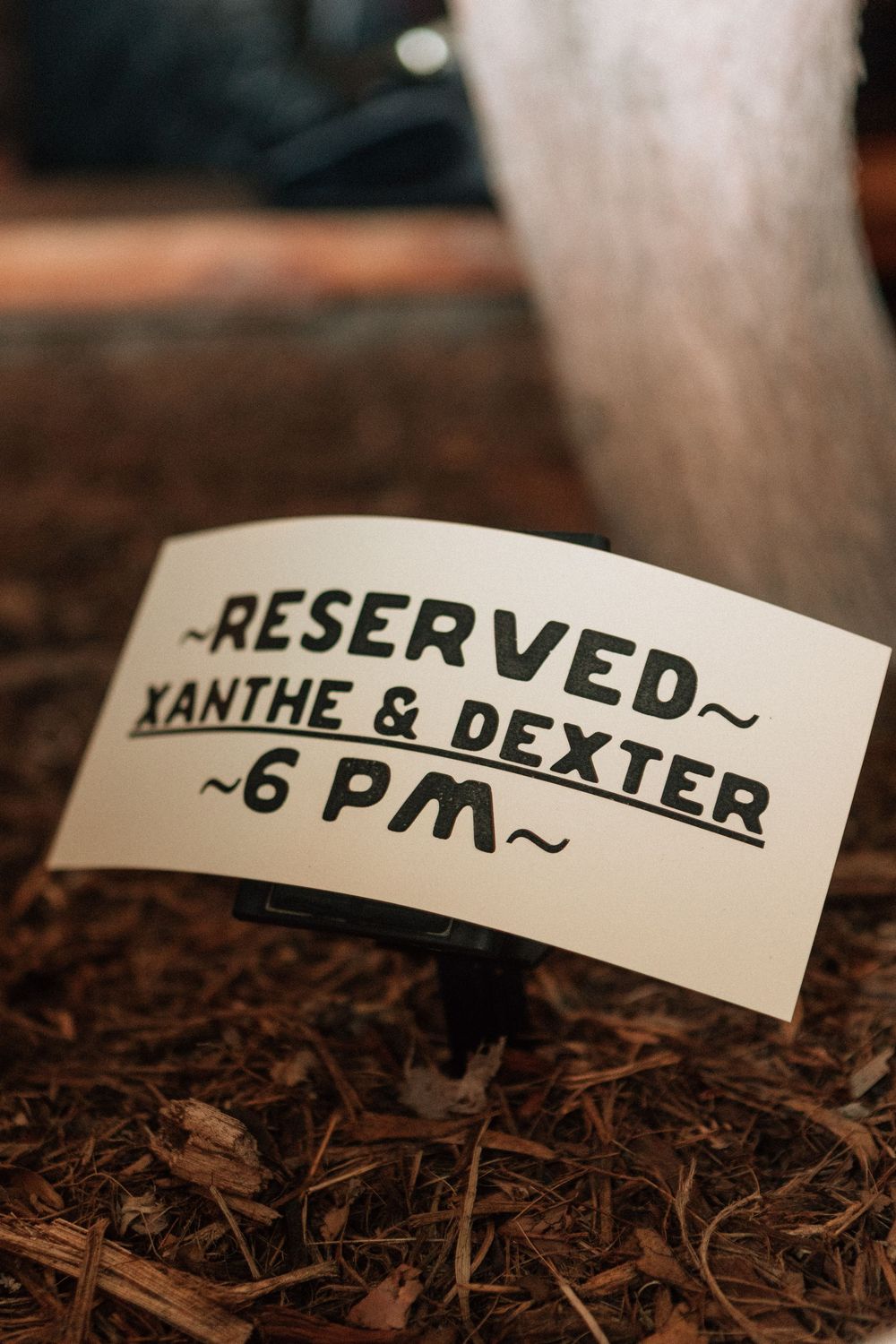Reserved for Xanthe and Dexter sign photographed by Holly Castillo.