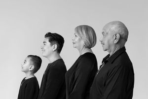 Black and white profile portraits of multiple generations in a row.