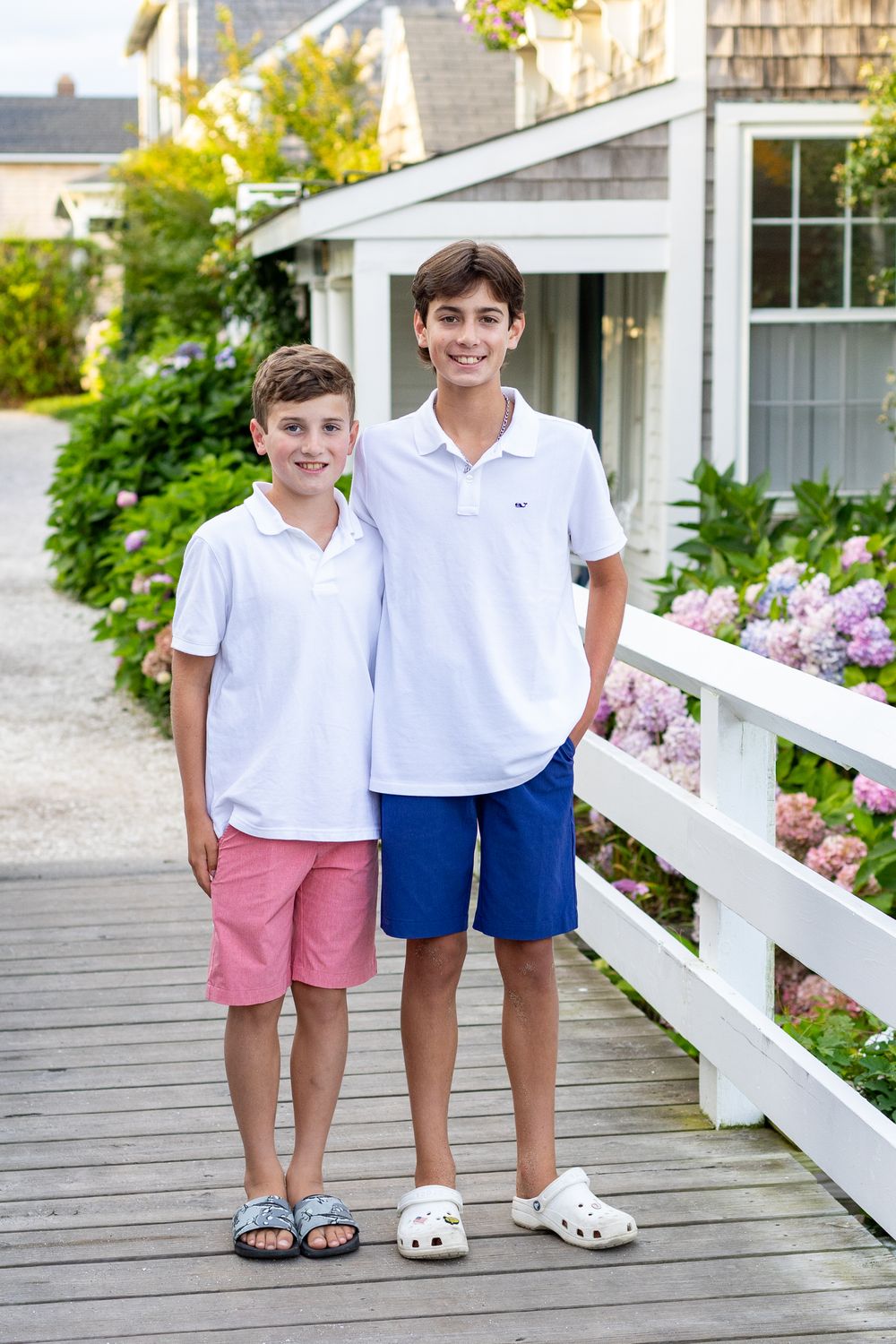 Two brothers pose together on Sconset Footbridge on Nantucket, MA by Lisa West Photography www.lisawestphotography.com