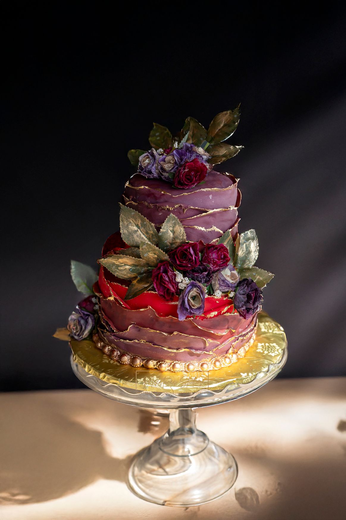 Garman Hill poolside jewel tone wedding two tiered cake red, purple, and gold