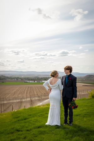 Garman Hill poolside jewel tone wedding bride and groom posing on hillside looking at each other