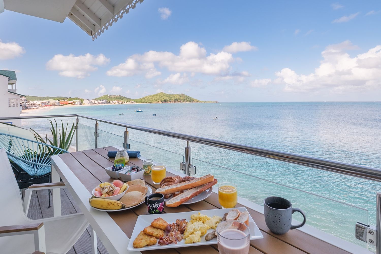 Scenic collage of beach resort views with dining tables, ocean vistas, and breakfast platters by turquoise waters.
