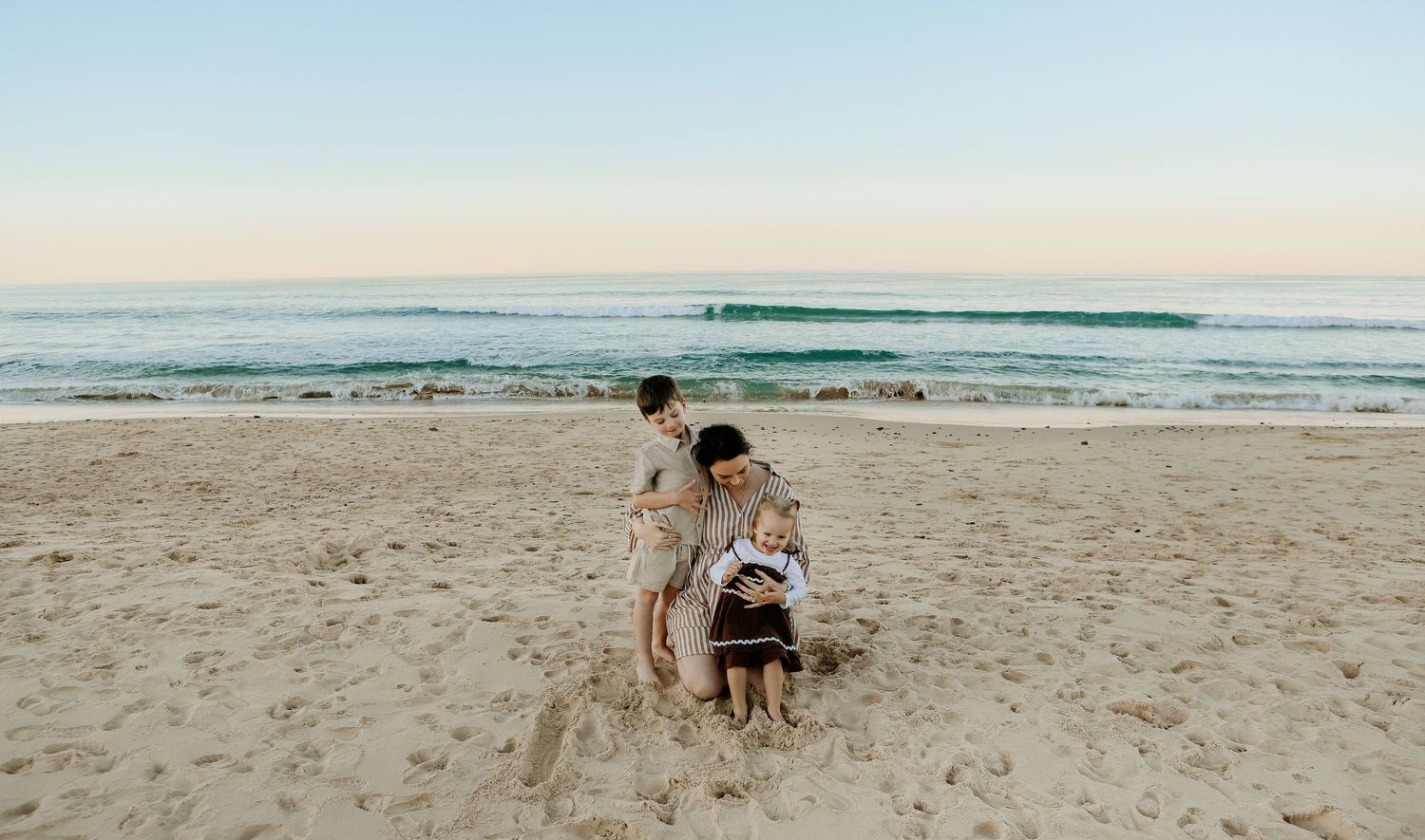 Mum and her kids at the beach