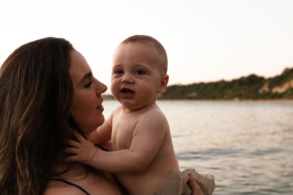 Intimate beachside photography session at golden hour.