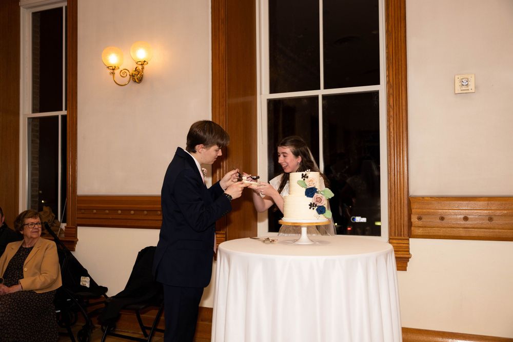 Cake cutting during wedding reception