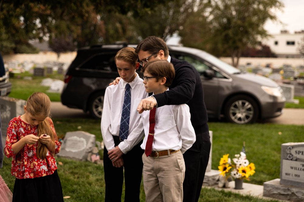 A father explaining to his sons.