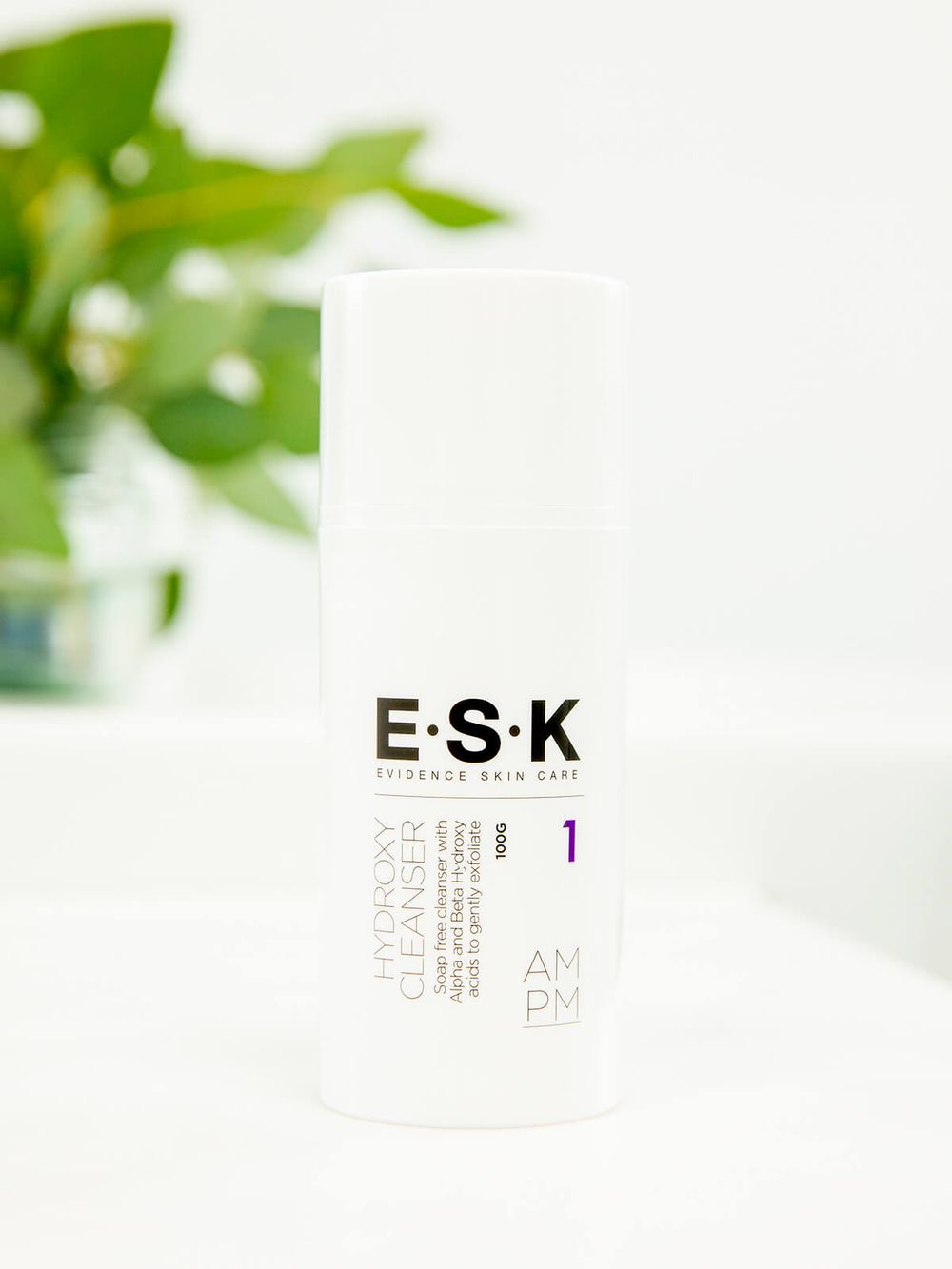 ESK product shot in  bathroom with greenery in the background