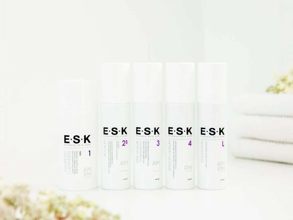 ESK product shot in  bathroom with greenery in the background