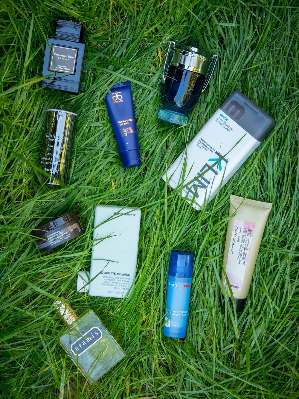 Mens beauty products sitting amongst the grass