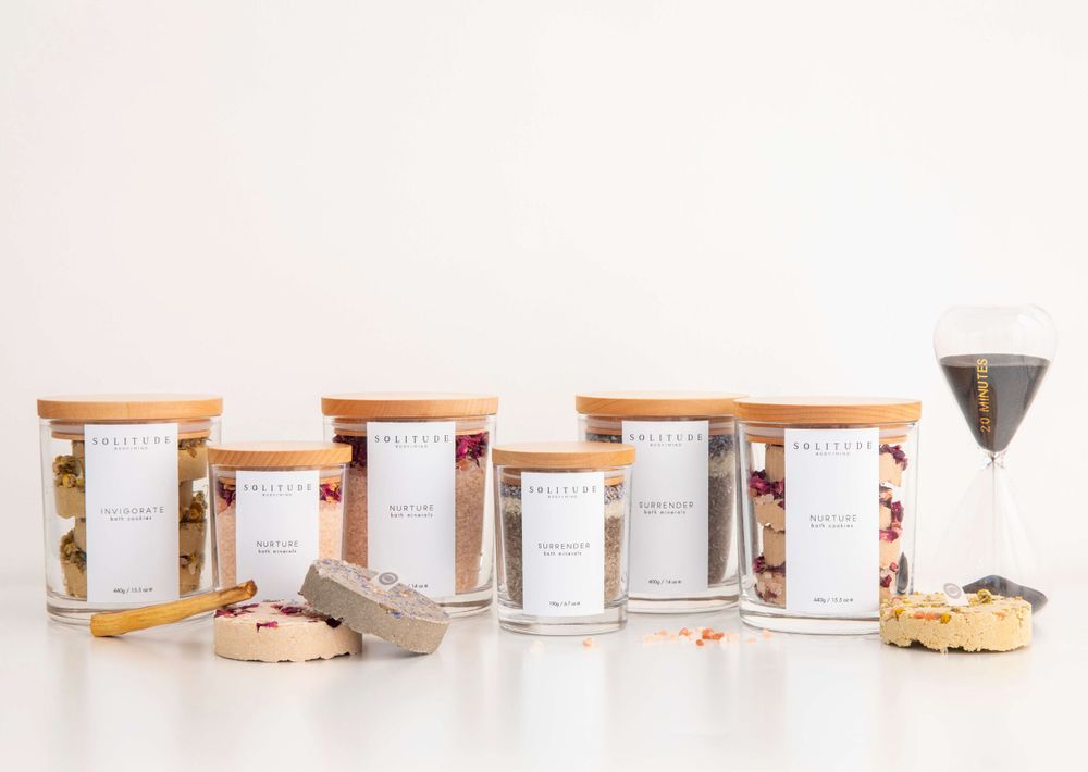 Solitude Body mind product shot in studio with hourglass and white background