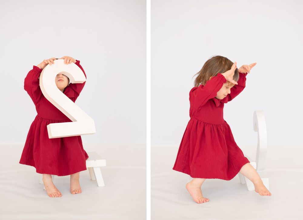 2 year old girl toddler milestone birthday session at natural light studio by Bartlesville Photographer Kristi Bray
