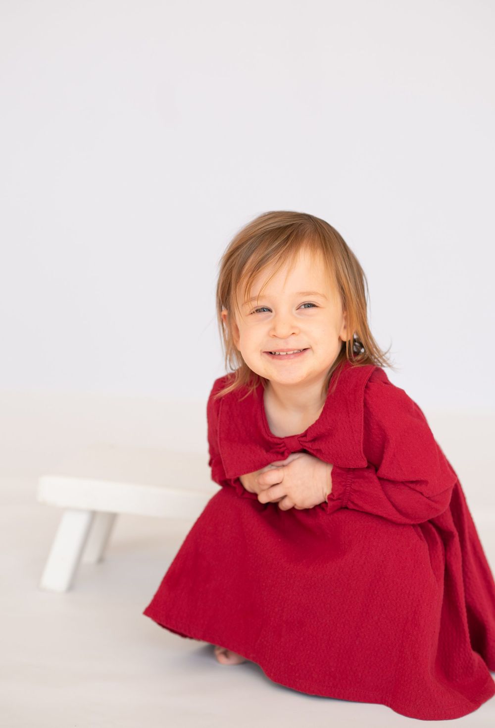 2 year old girl toddler milestone birthday session at natural light studio by Bartlesville Photographer Kristi Bray
