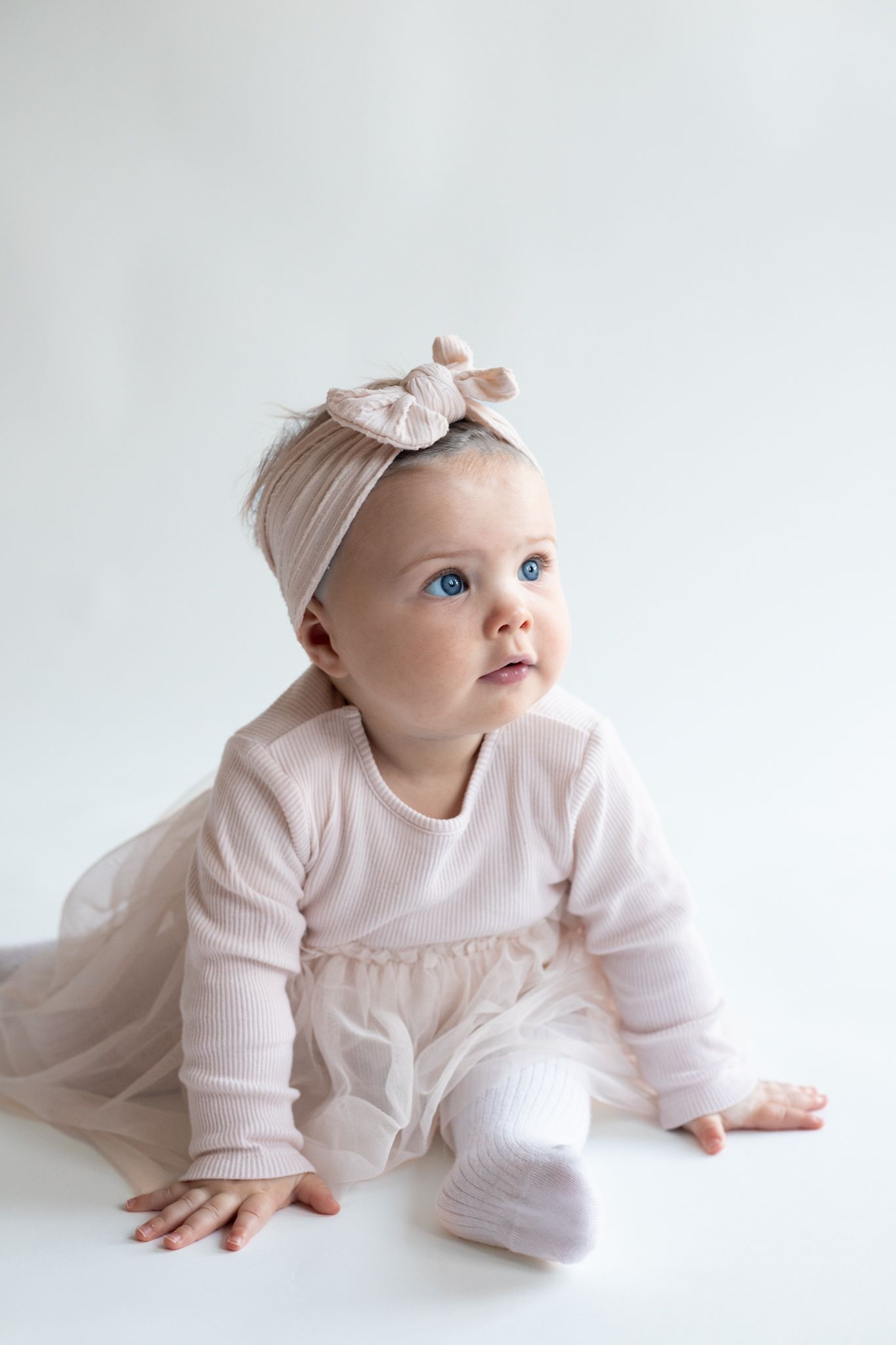 Natural light baby milestone session in Stevenage, Hertfordshire by a family photographer