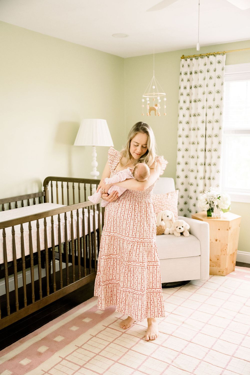 A series of five photos showing a nursery with pink decor, white furniture, and a dark wood crib against light green walls.
