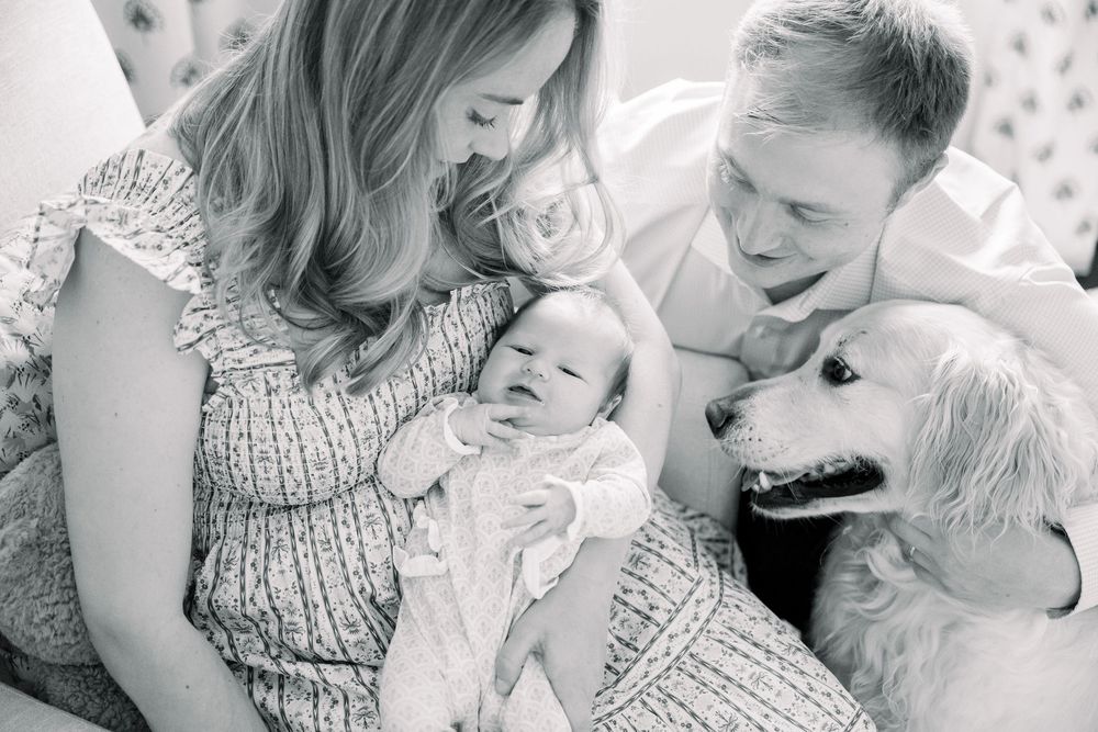Series of loving black and white photographs showing affectionate family moments together.