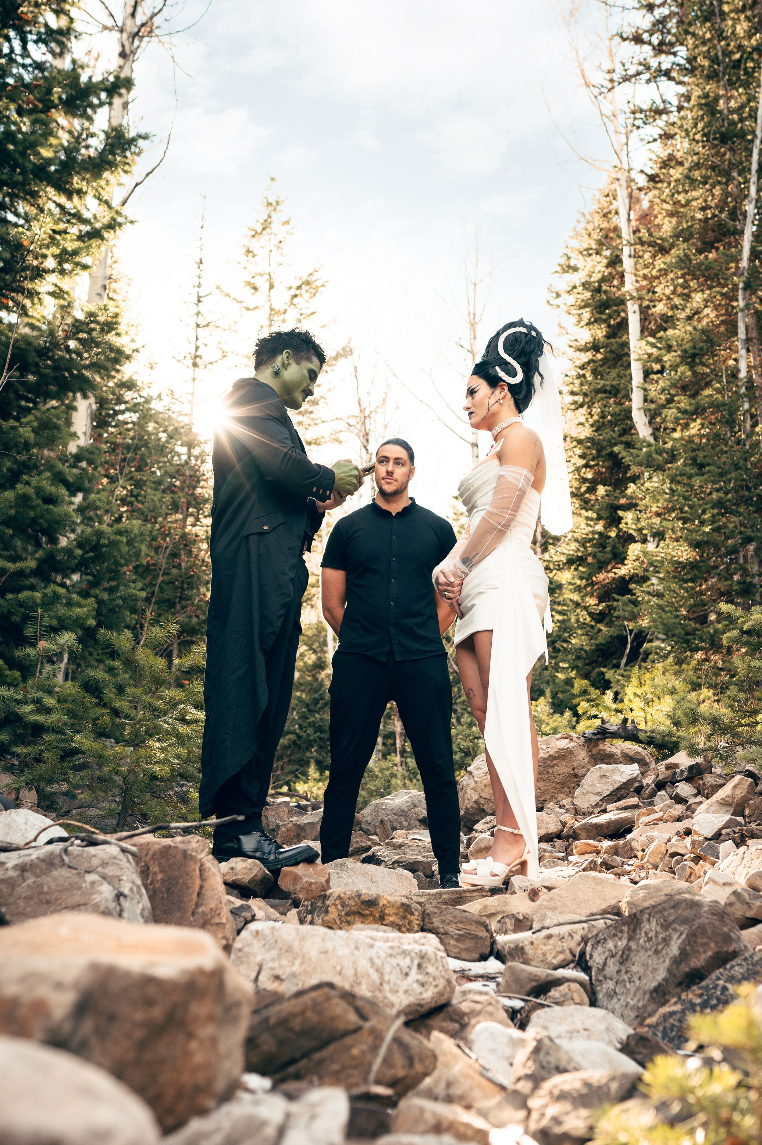 Park City Utah Elopement photography in the mountains. Frankenstein and His Bride. Creative posing and wedding photos on Halloween night