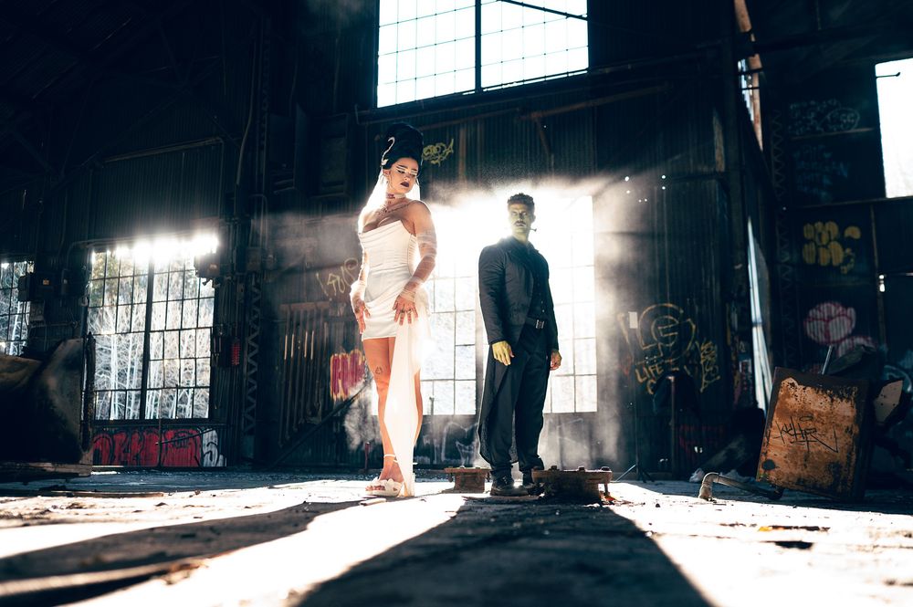 Park City Utah Elopement photography in the mountains and abandoned warehouse mill. Creative posing and wedding photos on Halloween night