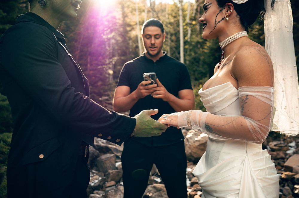 Park City Utah Elopement photography in the mountains. Frankenstein and His Bride. Creative posing and wedding photos on Halloween night