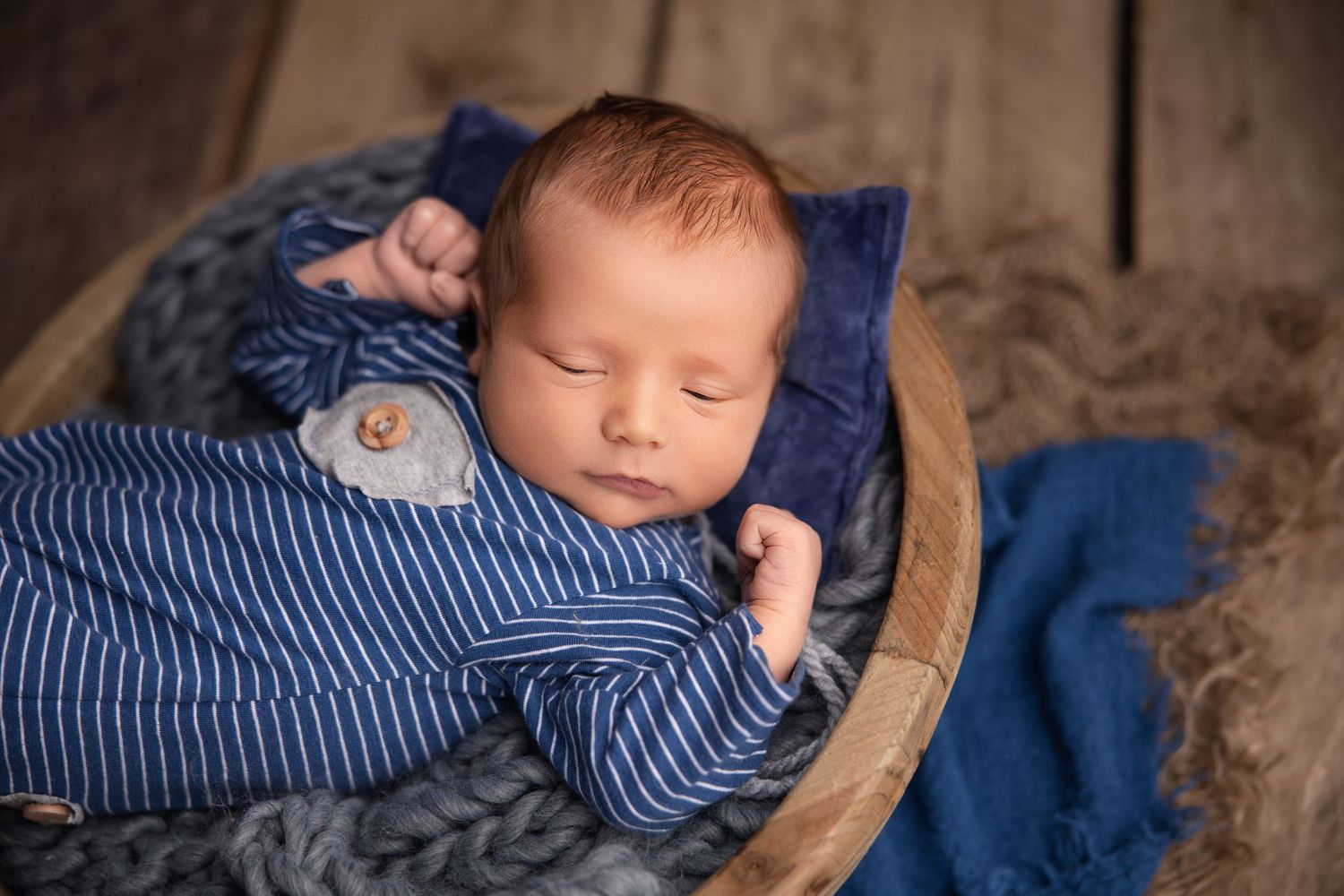 Bright-eyed newborn baby photographed awake during a Pleasant View newborn photography session