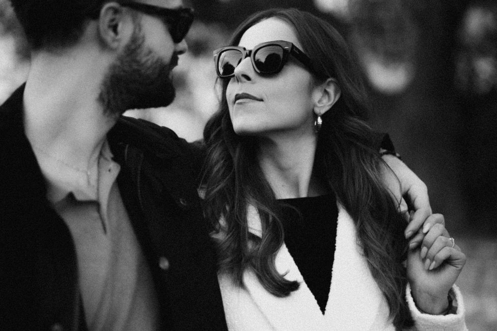 A series of black and white candid photographs showing people in sunglasses arranged in a horizontal strip layout.