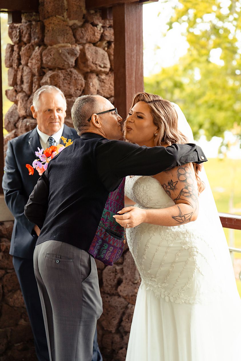 A series of four wedding photos showing a tender moment between a bride and groom during their ceremony.