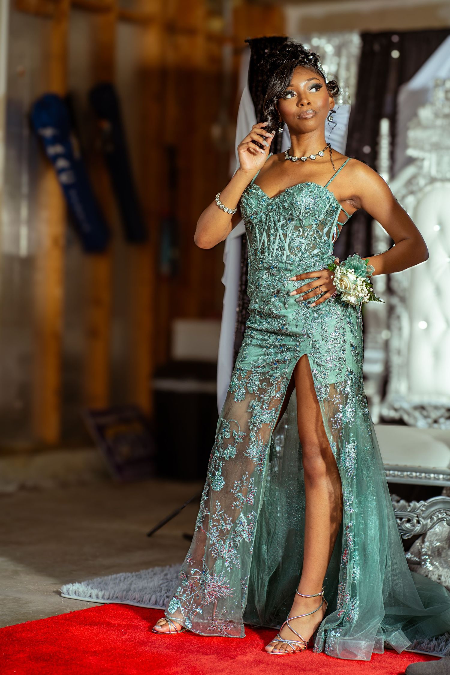 Stunning mint green sequined gown with high slit on red carpet.