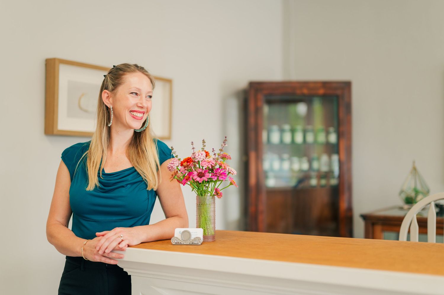 Professional branding headshot session of women owned chiropractic office