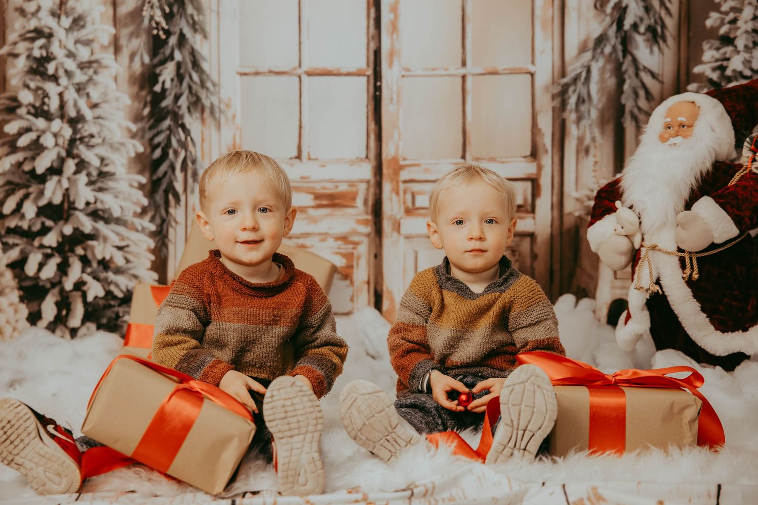 Christmas scene with wrapped presents and Santa decor against a snowy window backdrop.