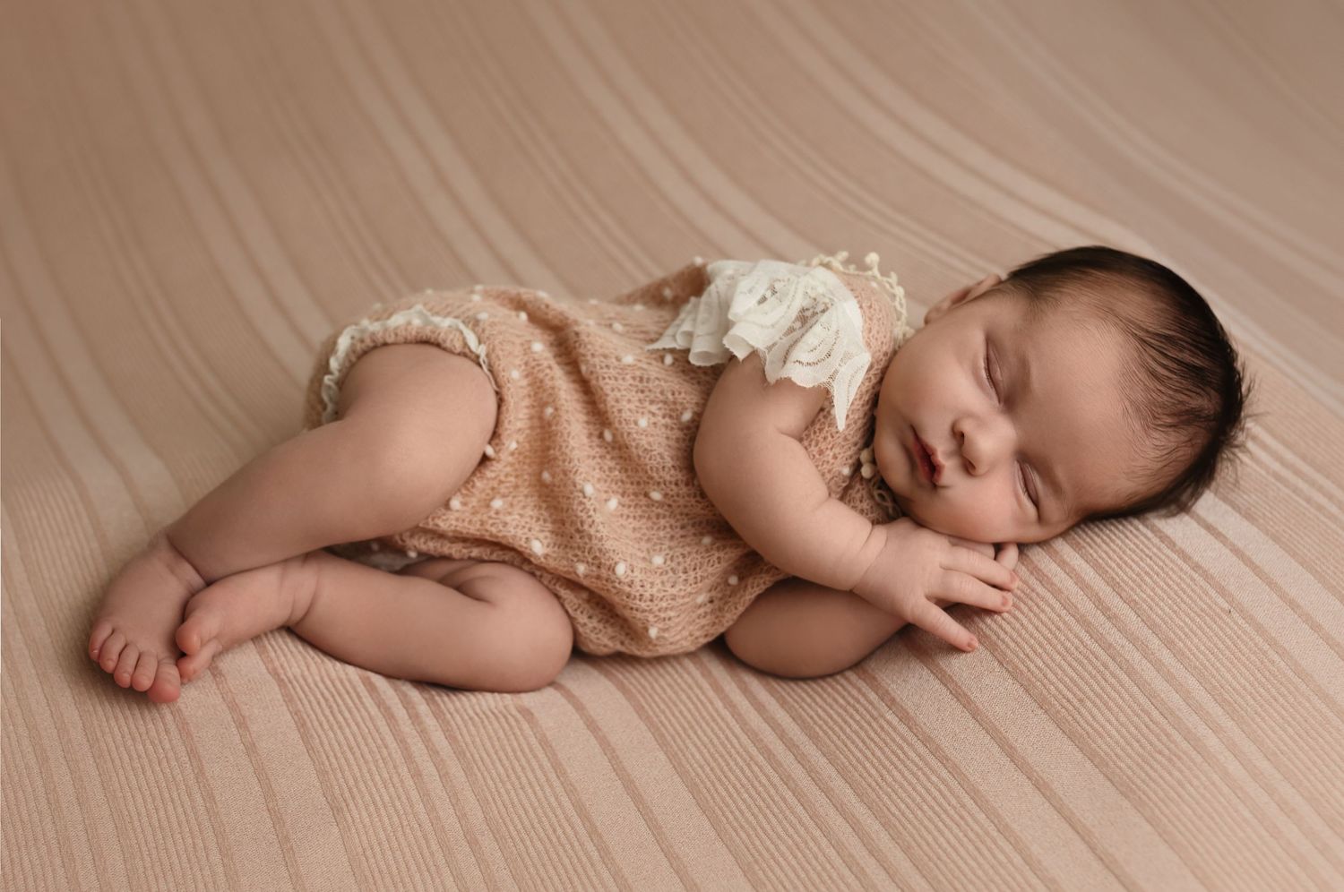 Harrisonburg photographer, baby, newborn, family, maternity, girl in blush romper sleeping on blush blanket