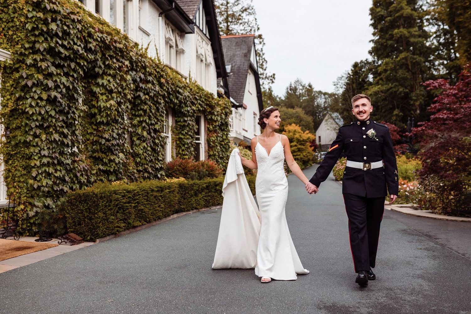 Lake District Wedding Photography - Emma and Joe walk hand in hand at Linthwaite House
