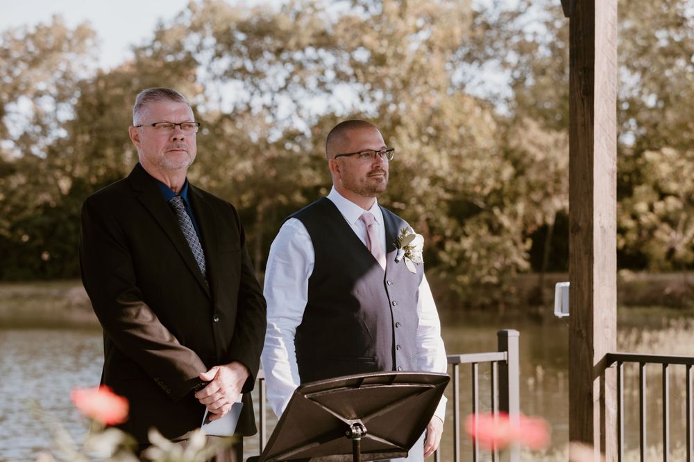 Groom and officiant for summer backyard wedding in Ohio photography by Vicci Photo Dayton Ohio Photographer
