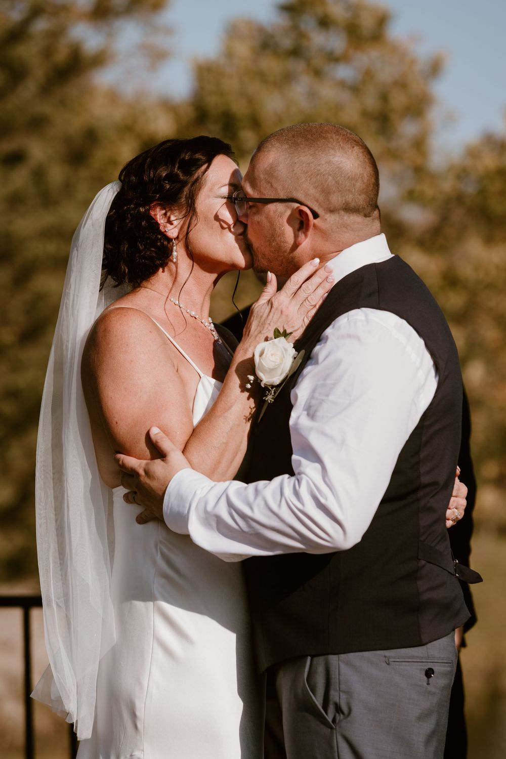 First kiss Bride and Groom summer backyard wedding in Ohio photography by Vicci Photo Dayton Ohio Photographer