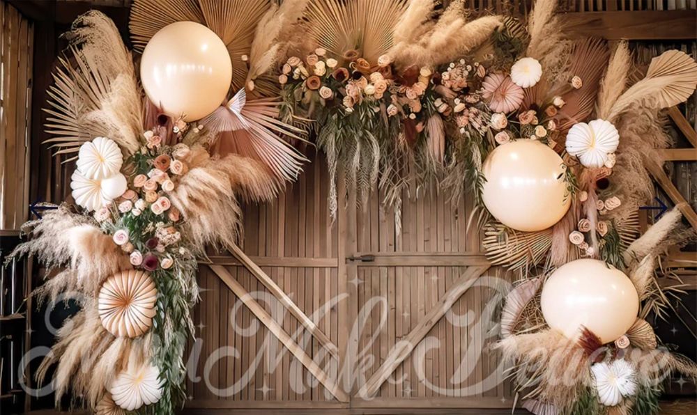 Boho wedding arch with pampas grass, balloons and dried floral arrangements.