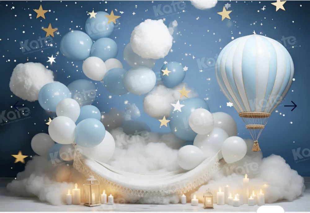 Whimsical hot air balloon scene with clouds, stars and white balloons against night sky backdrop.