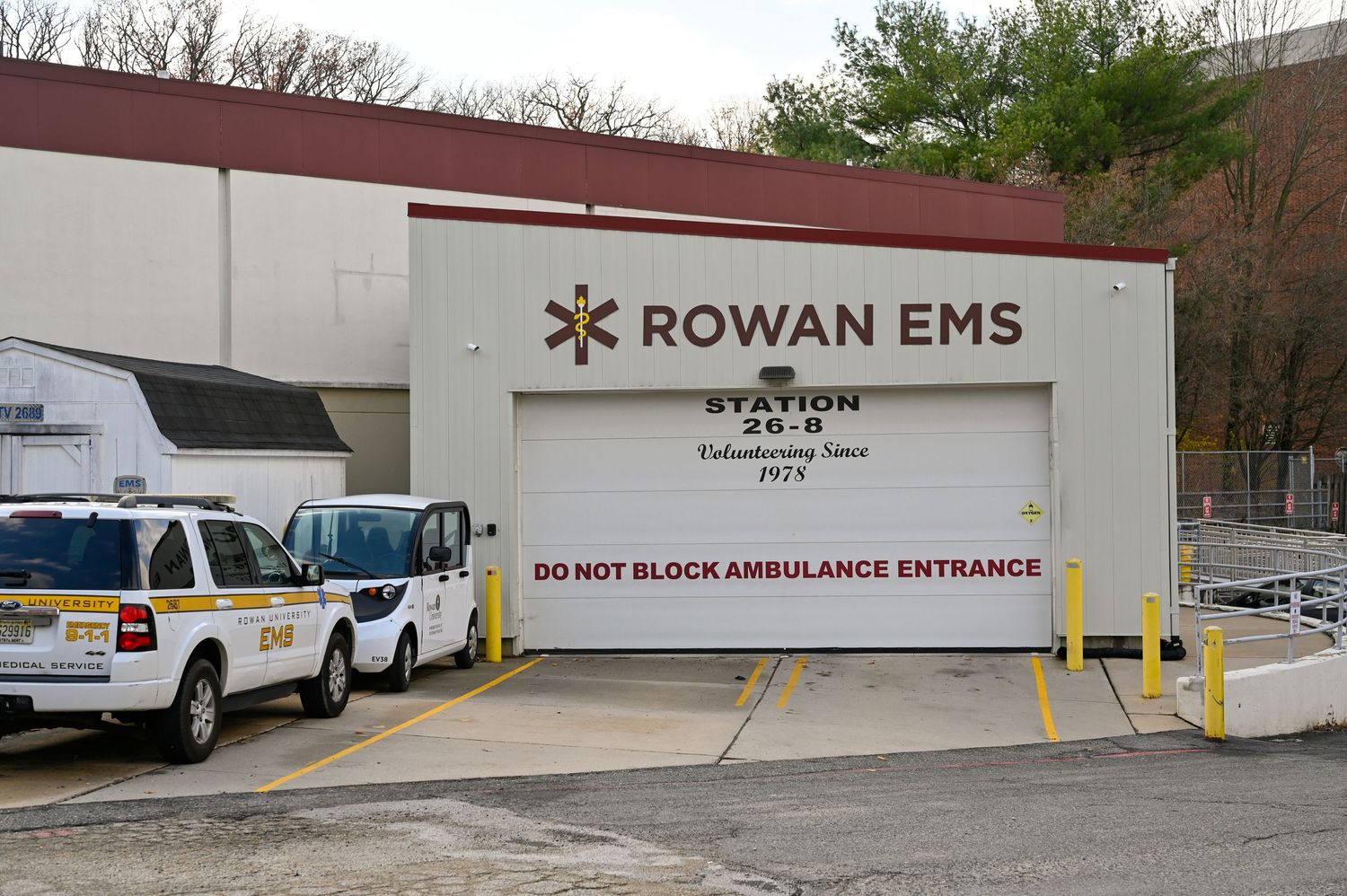 Rowan EMS station entrance with ambulances parked outside the bay doors.
