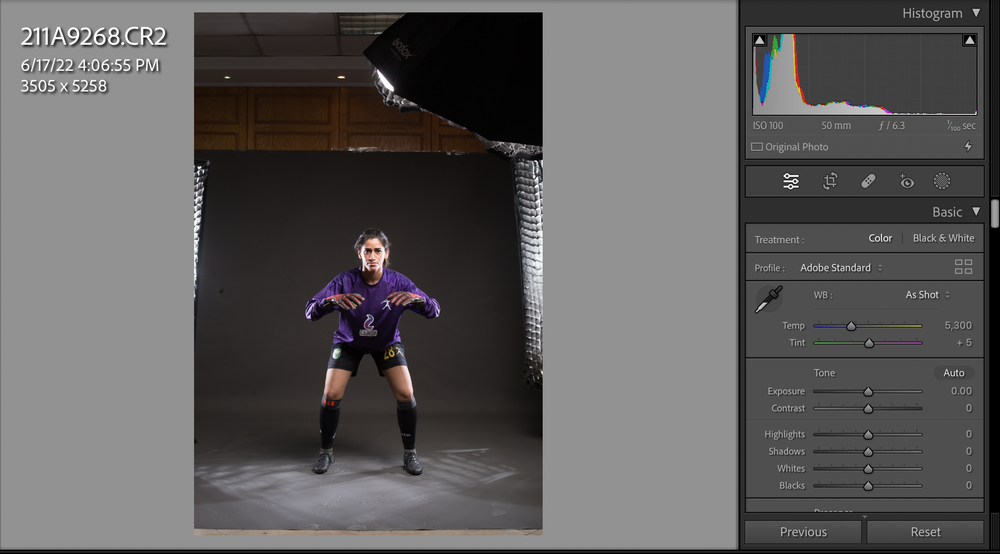 Dynamic sports photography session showing soccer goalie techniques in studio lighting - goalkeeper