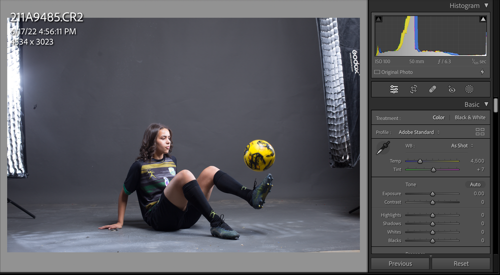 Soccer player practicing ball control moves in a professional studio - free styling