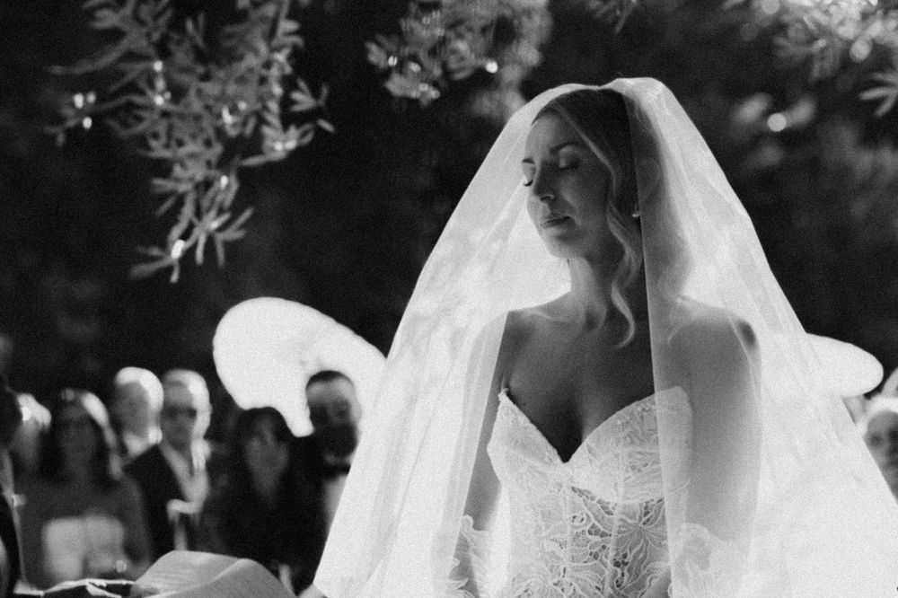 A black and white photo collage showing different moments of a bride in her wedding dress during a romantic celebration.