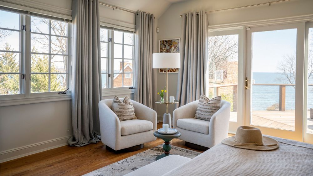 seating area in bedroom with ocean view, Soudi Amini Design