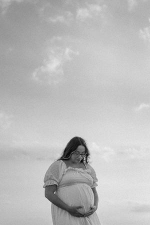 Moody black-and-white maternity portrait Lake Arrowhead, Wichita Falls TX photographer.