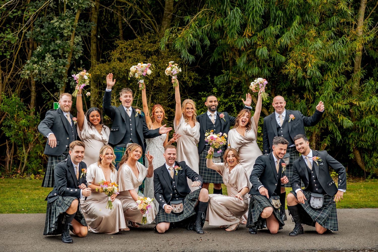 Documentary photography capturing group wedding photos.