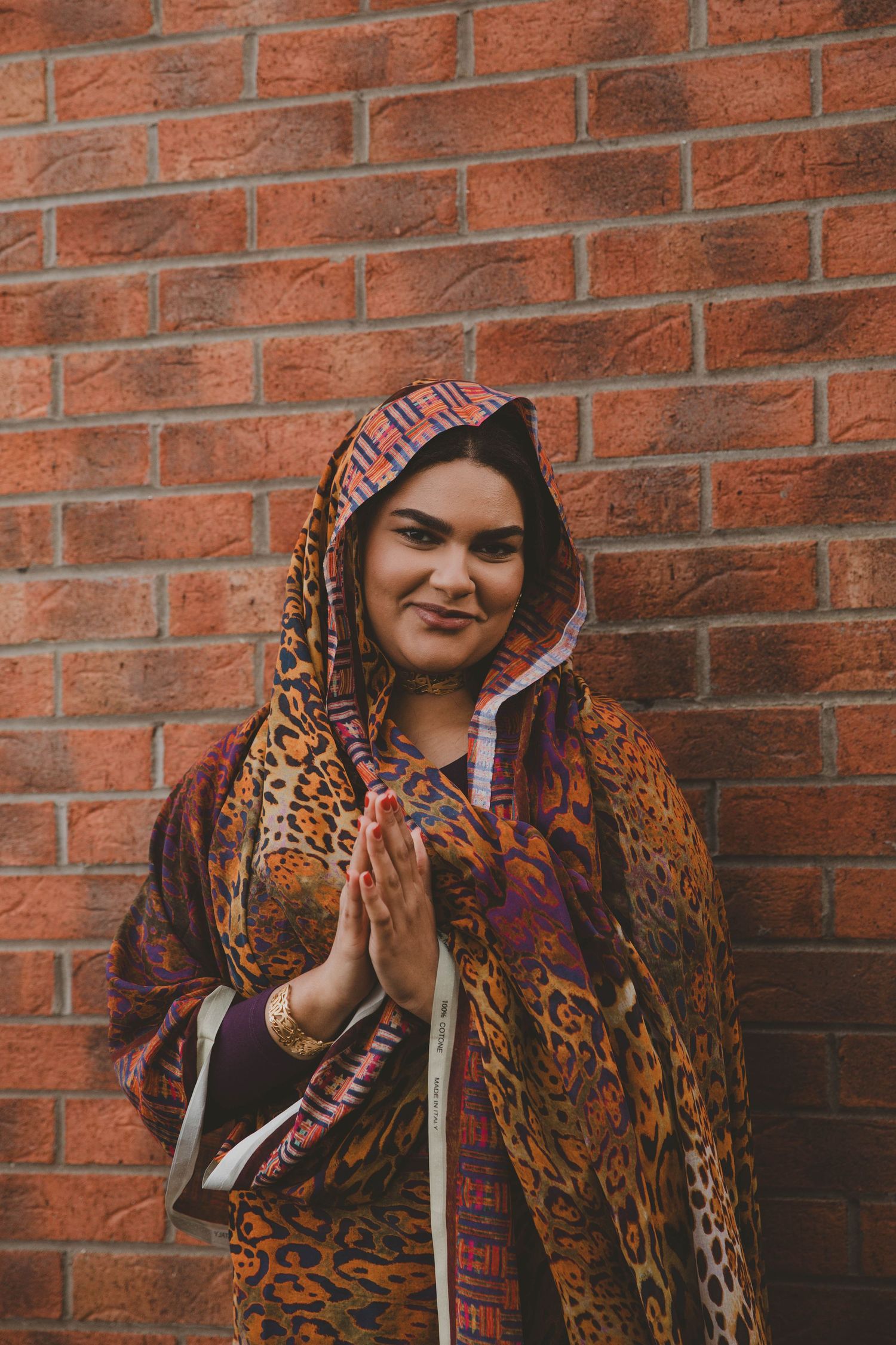 Portrait of Sudanese/Welsh Model, wearing silk Toub in N.WALES, designed by HIMA RAHAMA. Jewellery by KUKU Jewellery