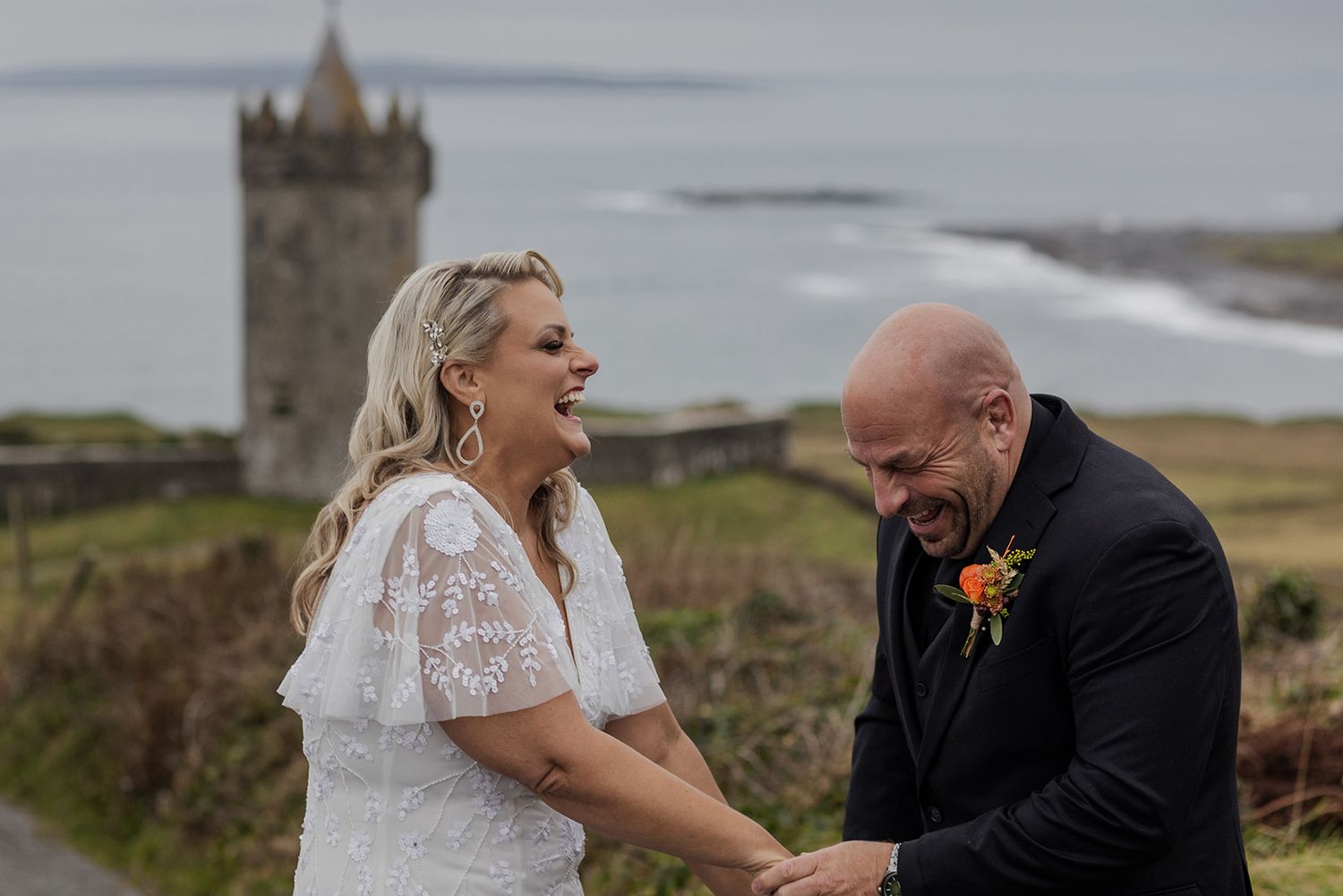 Adventure couple session at Doonagore Castle overlooking the Aran Islands.