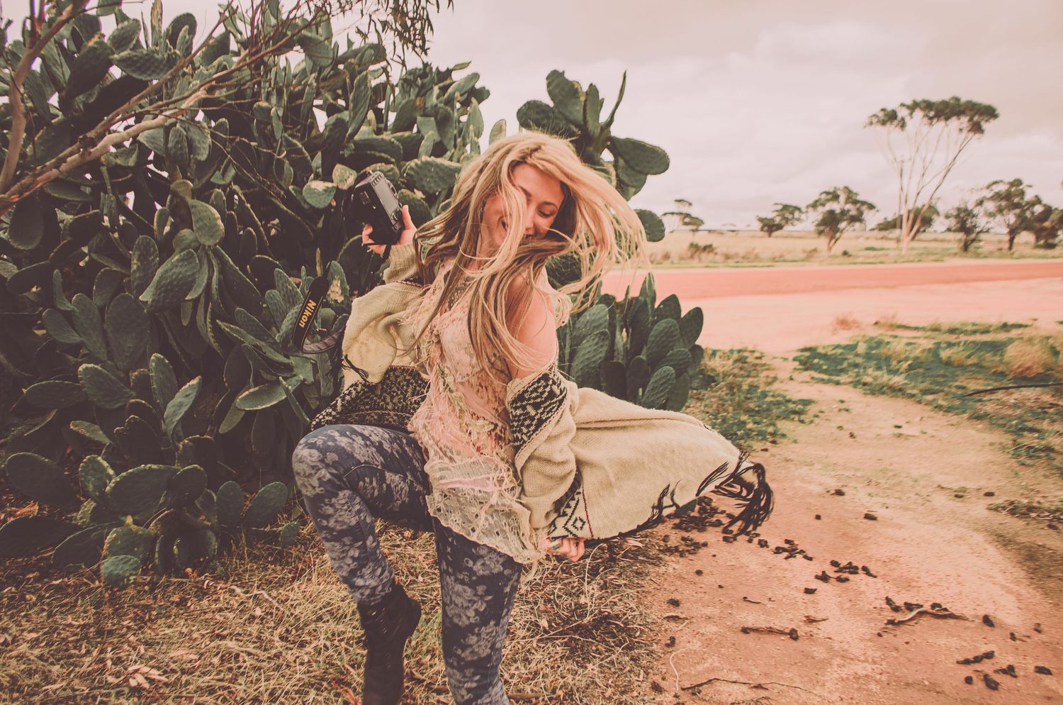 Edmonton Adventure Photographer Sarah Thiessen with Wild Love Media captures nature scenes at golden hour in desert landscape.